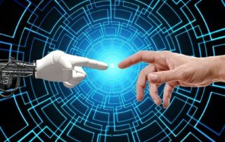 An image of a robot and a human finger touching each other creating light blue and green waves of technology