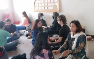 Group of women meditating at an in person Theta Healing Pakistan workshop conducted by Sana Naseem Quanta Mind